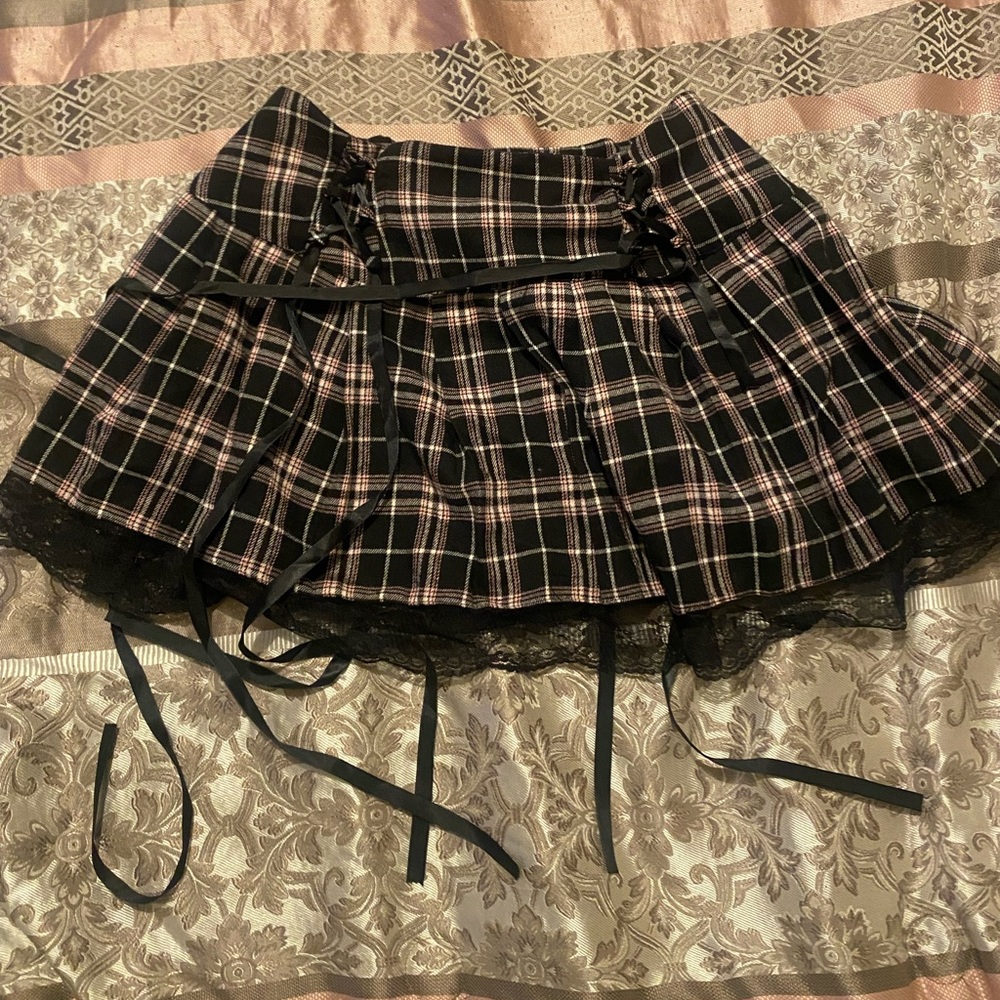 Pink and black mini skirt.